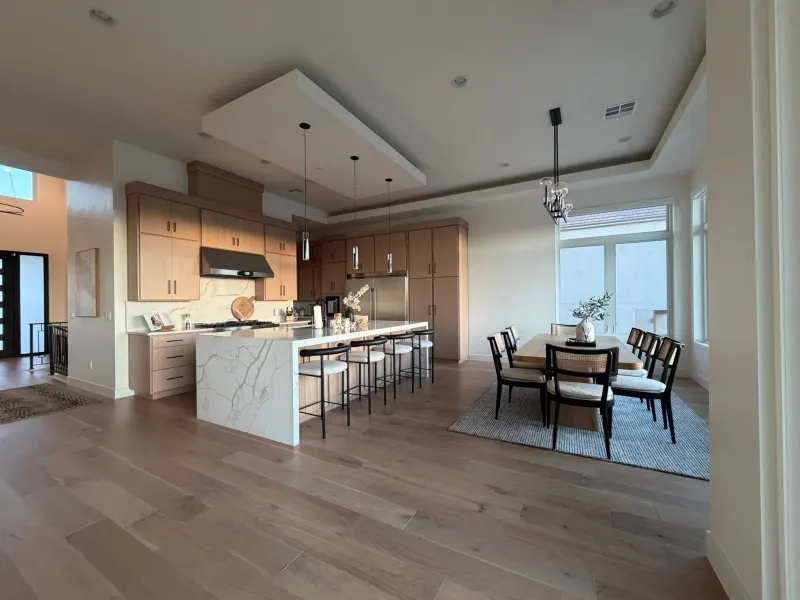 Bright, spotless kitchen and dining area in a St. George home