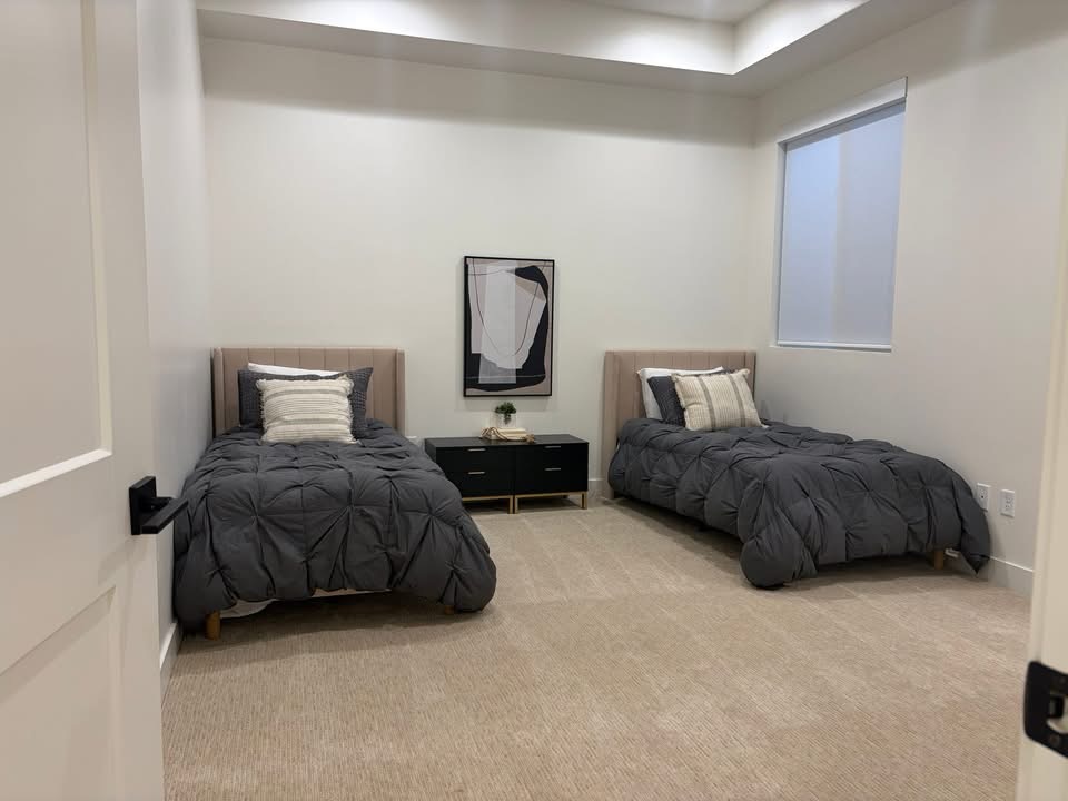 Clean luxury twin bedroom suite